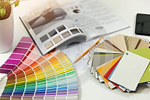 designer workplace - interior paint color and furniture samples photo