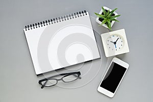 Desk above office desk with notebook stationery