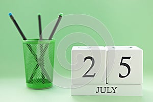 Desk calendar of two cubes for July 25