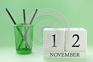 Desk calendar of two cubes for November 12