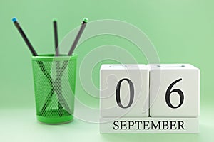 Desk calendar of two cubes for September 6