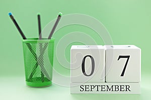 Desk calendar of two cubes for September 7