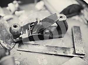 Desk of a carpenter with some tools