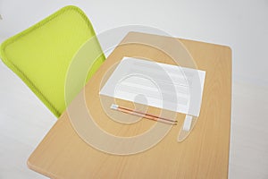 Desk and chair with a sheet