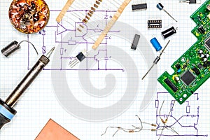 On the desk electronics. Tools and electronic components.