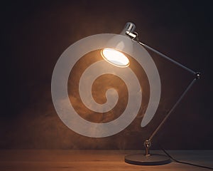 Desk lamp in smoke, copy-space background