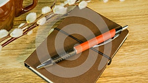 Desk with notepad, ballpoint pen