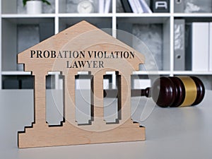 Desk with a plate probation violation lawyer. photo