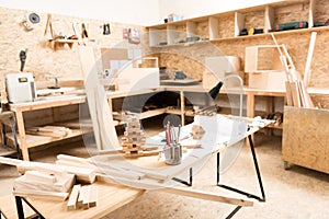 Desk with professional instruments are in joinery photo