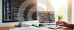 The desk setup showcasing coding on a dual-screen workspace with natural light. AI generated image