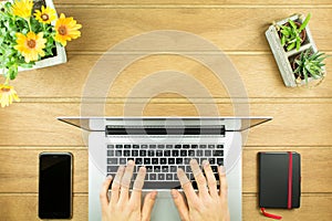 Desk shot Flatlay from above with someone writing and a searchbar