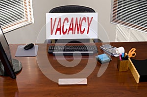 Desk and Vacancy Sign