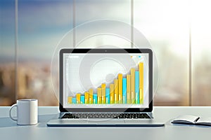 Desktop with business chart, coffee mug and diary