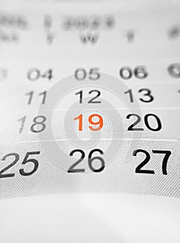 Desktop calendar dates selective 19 dates red color close up, 2023 concept photo