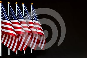 Desktop flags of USA on black background with copy space. Concept of the patriotic holidays