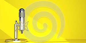 desktop microphone on yellow copy space