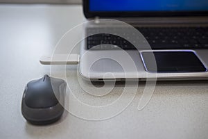 Desktop with modern notebook, optical mouse and 4g modem connected in usb port of laptop