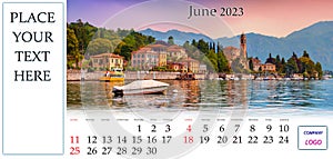 Desktop monthly calendar template with place logo and contact information. photo