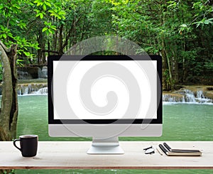 Desktop white frame on work table and waterfall nature