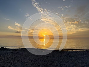 Desolate Turtle Beach on Florida\'s Gulf coast right before a beautiful Blue and Orange sunset