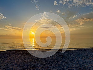 Desolate Turtle Beach on Florida\'s Gulf coast right before a beautiful Blue and Orange sunset