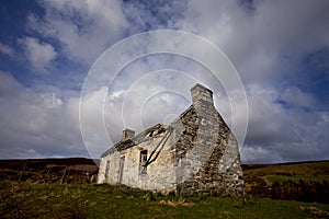 A desolated crofter`s house in Scotland photo