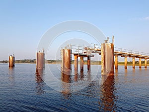 A desolated metal constructed dock at river