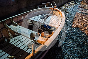 Desolated Rowboat On The Seashore