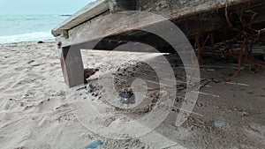 desolation of a beach in the aftermath of a storm, marked by the undeniable effects of climate change