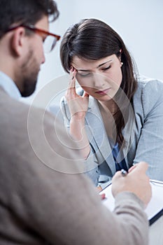 Despair woman receiving psychotherapy