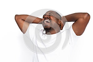 Desperate African American man screaming with hands on head