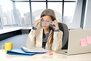 Desperate businesswoman suffering stress at office laptop computer desk
