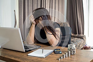 Desperate businesswoman worried in office, Asian woman headache