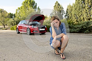 Desperate confused woman stranded with broken car engine crash accident calling on mobile phone