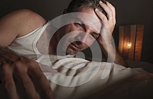 Desperate and depressed middle aged man unable to sleep suffering anxiety crisis and depression feeling overwhelmed and frustrated