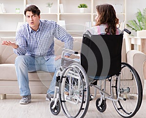 Desperate disabled person on wheelchair