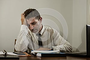 Desperate financial executive man in stress - corporate business lifestyle portrait of stressed and overwhelmed businessman