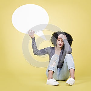 Desperate girl holding a blank white sign board.