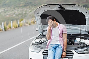 Desperate man after a car breakdown