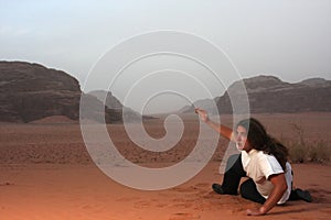 Desperate man in the desert longing for something