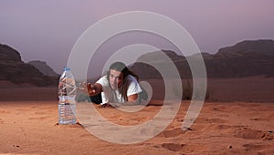 Desperate man in the desert longing for water