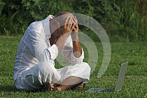 Desperate man with laptop