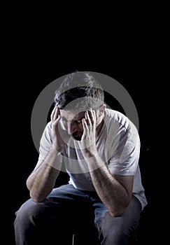 Desperate man suffering emotional pain, grief and deep depression