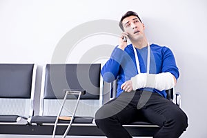 Desperate man waiting for his appointment in hospital with broke