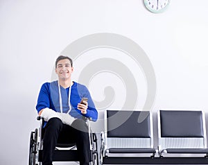 Desperate man waiting for his appointment in hospital with broke