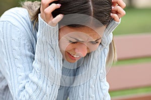 Desperate sad teen complaining alone