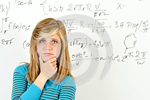 Desperate student girl front of maths board