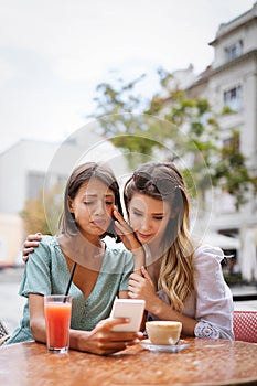 Desperate woman getting support from her best friend