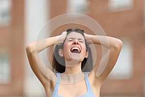 Desperate woman yelling in the street