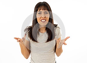 Desperate young attractive woman with angry face looking furious. Human expressions and emotions